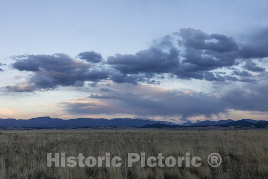 Como, CO Photo - Dark clouds rim the horizon in Park County, Colorado, near Como.