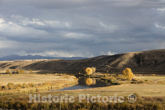 Grand County, CO Photo - The Autumn Sun shimmers Over The CO River Near Kremmling in Grand County, CO.