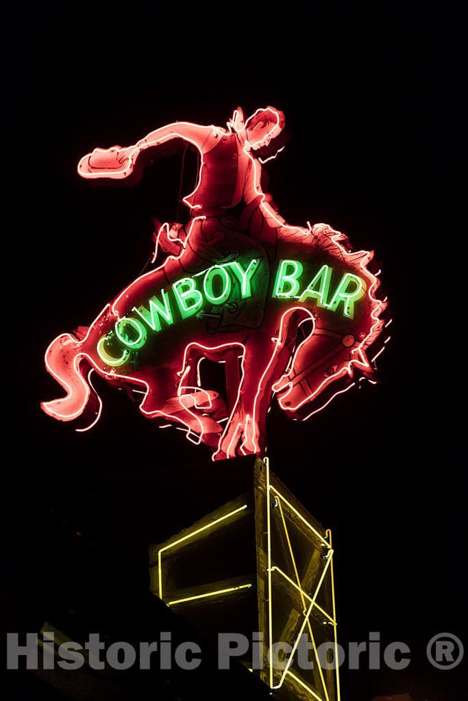 Jackson Hole, Wyoming Photo - Neon sign of the Million Dollar Cowboy Bar in Jackson Hole, Wyoming.