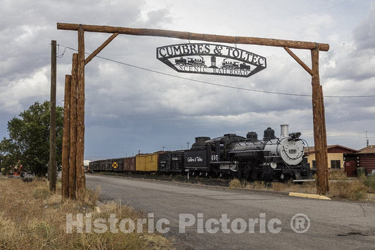 Conejos County, CO Photo - Entrance Sign and Vintage Train at The Cumbres & Toltec Scenic Railroad Station in Antonito, in Conejos County, Colorado.