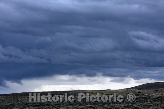 Photo - Dark Clouds roil Above Big Creek Cattle Ranch on The Colorado Border, Near The Towns of Riverside and Encampment, in Carbon County, Wyoming- Fine Art Photo Reporduction