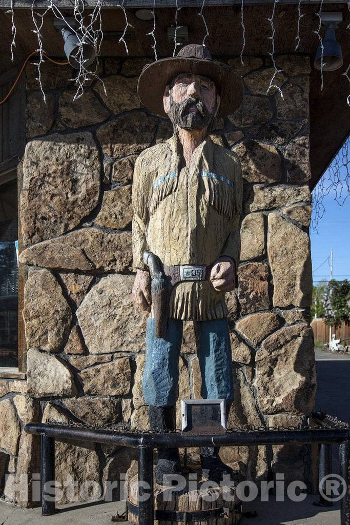 Photo - Woodcarver Jim Dickinson's Statue of Jim Bridger, in Front of The Melody Liquor Store in Lander, Wyoming- Fine Art Photo Reporduction