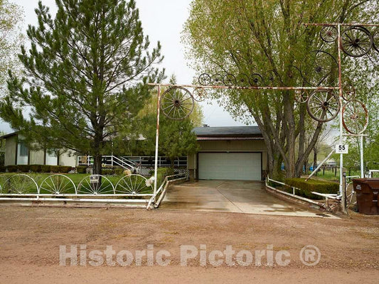 Photo - House That Makes Liberal use of Wagon Wheels in The Town of Fort Bridger, Wyoming- Fine Art Photo Reporduction