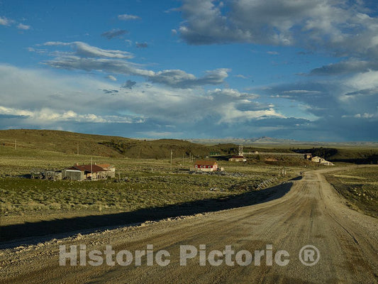 Photo- Distant view of what's left of South Pass City, a mining boomtown of 2,000 people in the 1860s in what is now Fremont County, Wyoming, that by 1949 was a ghost town