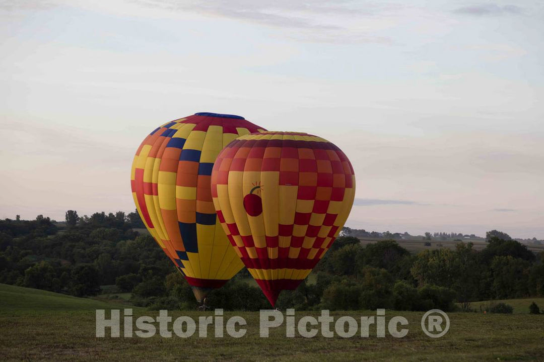 Colorful Balloons, Including a Saucy inflated Parrot, Delight The Assembled Crowd with a Night Glow as Pilots fire The Burners on The Ground at The National 3