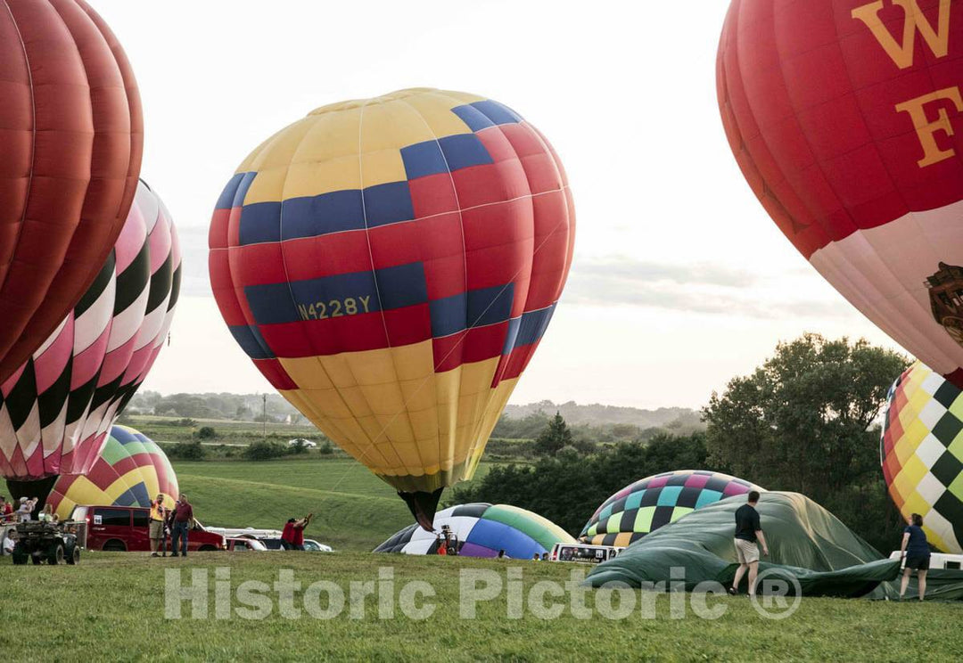 Colorful Balloons, Including a Saucy inflated Parrot, Delight The Assembled Crowd with a Night Glow as Pilots fire The Burners on The Ground at The National 5