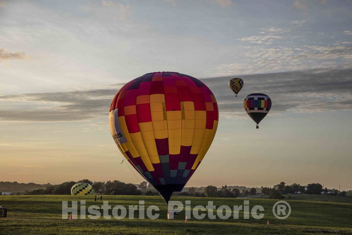 Photograph - Colorful Balloons Delight The Assembled Crowd with a Night Glow as Pilots fire The Burners on The Ground at The National Balloon Classic 1