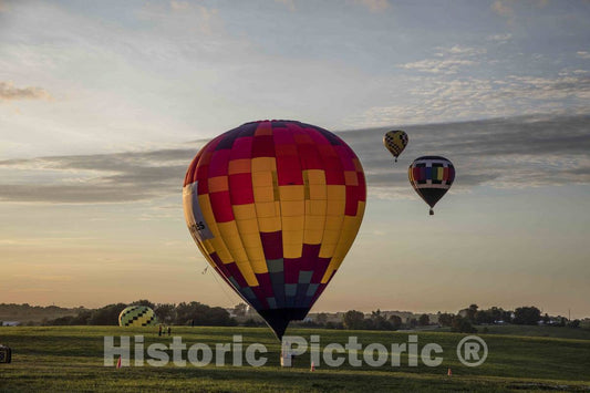 Photograph - Colorful Balloons Delight The Assembled Crowd with a Night Glow as Pilots fire The Burners on The Ground at The National Balloon Classic 1