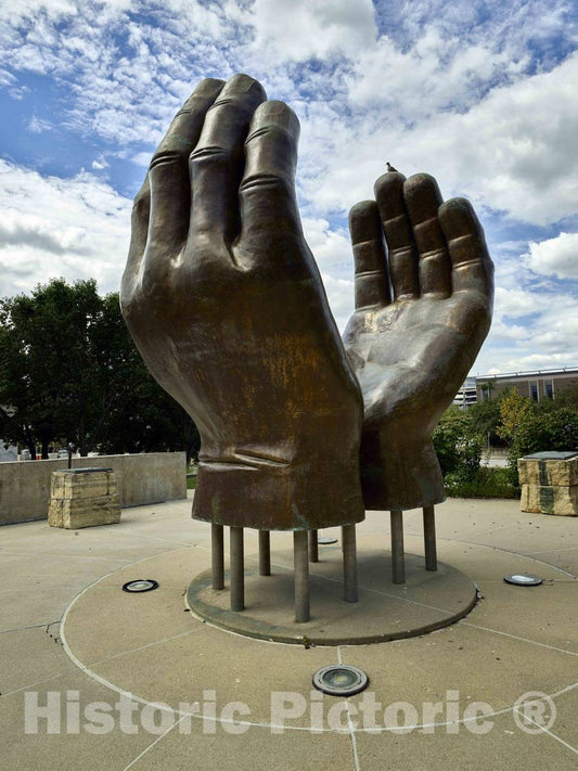 Photo -"A Veteran's Prayer for Eternal Peace," a bronze sculpture by Christopher Bennett in the center of a memorial dedicated to military chaplains in Des Moines, Iowa