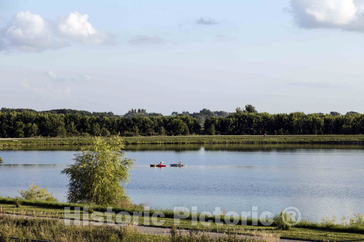 Photo - Rowers enjoy a summer day at Grundy County Lake near the town of Dike, Iowa- Fine Art Photo Reporduction