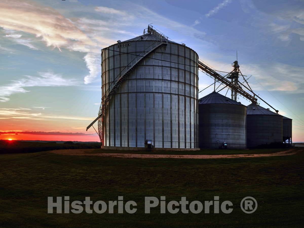 Photo - The Sun Sets Behind Large, Metal silos on a Farm in Jackson County, Iowa- Fine Art Photo Reporduction