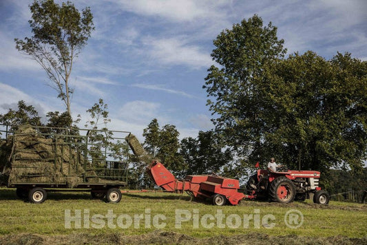 Photo - A Tractor-Pulled baler ejects a hay Bale in La Crosse County, Wisconsin- Fine Art Photo Reporduction
