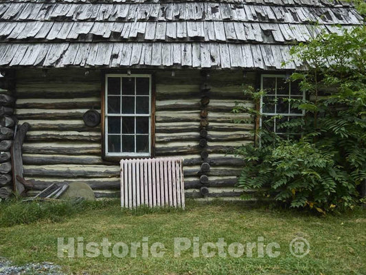 Photo- Detail of an old log storage building at Dells Mill, a gristmill built on Bridge Creek in 1864 that operated until 1968 in the Eau Claire County, Wisconsin, town of Augusta