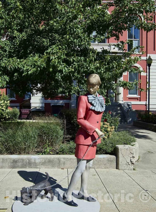 Photo- A Woman and her Pooch, one of The 11 installations of Life-Sized Trompe L'Oeil Painted Bronze Statues Around Crown Point, Indiana, Created by John Seward Johnson II