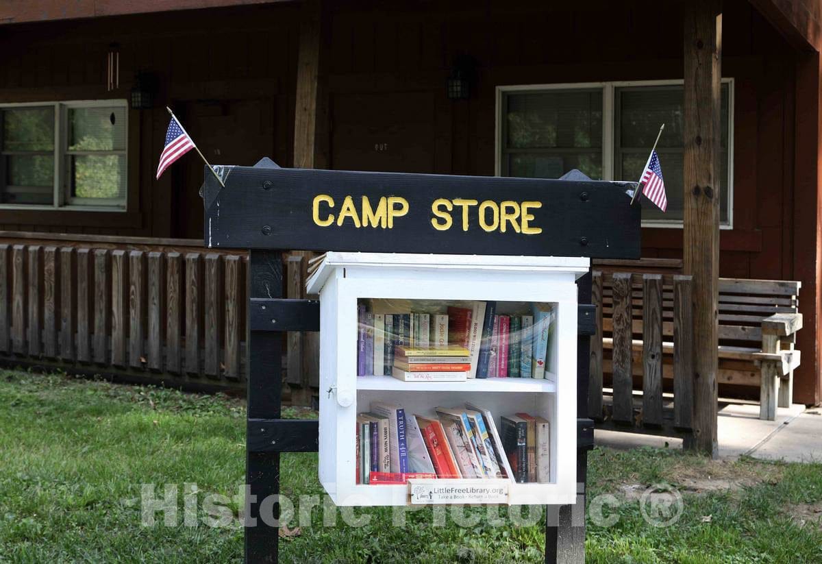 Photo- What is sometimes called a"birdhouse library," is a free library at which people are welcome to take and leave books, at the camp store of Indiana Dunes State Park