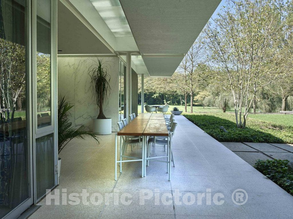Photo- Covered Stone Veranda at The Miller House, considered a Modern-architecure gem Designed by Finnish-American Architect Eero Saarinen and Completed in 1957 in Columbus 1