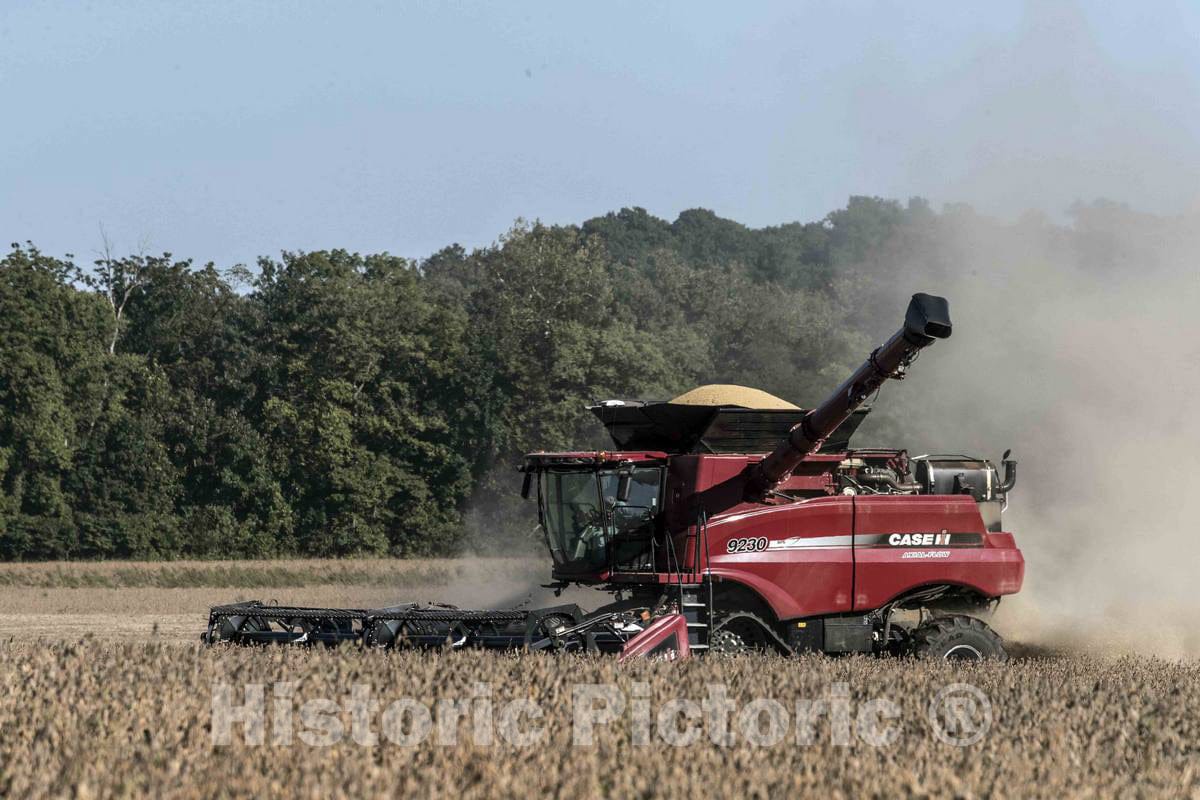Photo - A harvester kicks up dust in a cornfield near Bridgeton in Parke County, Indiana- Fine Art Photo Reporduction