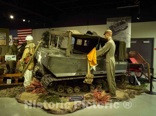 Photograph - Display at the Studebaker Museum in South Bend, Indiana, that presents a variety of automobiles, wagons, carriages, and military vehicles related to the Studebaker Corporation 1