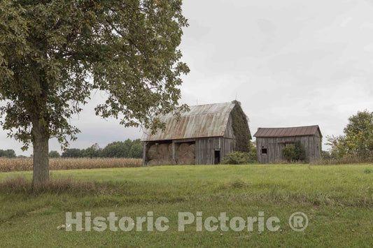 Photo- This barn is Steuben County, Indiana, has seen Better Days, but it Still Serves to Keep hay Rolls Out of The Elements, which can be Severe, Especially in Wintertime