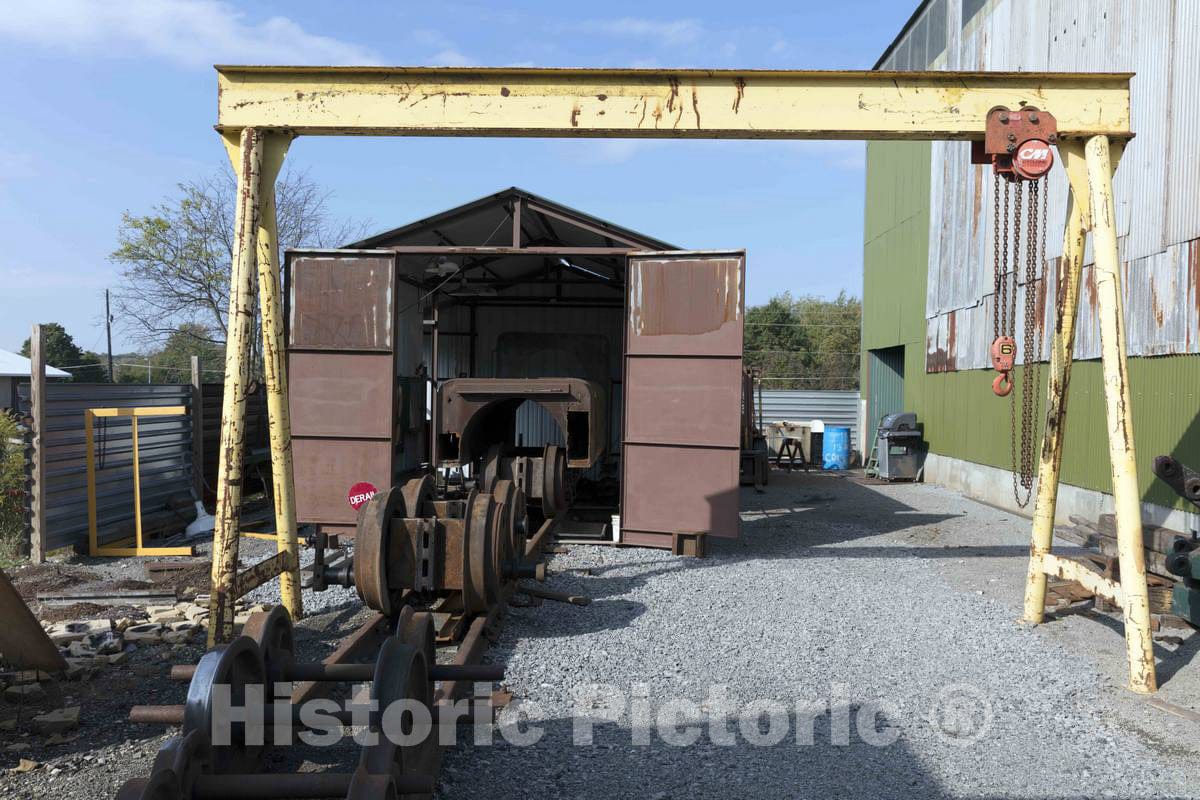 Photograph- Small enginehouse holding a demonstration model of a steel mill's narrow-gauge railroad components; part of President Rick Rowlands' and other Youngstown Steel Heritage Foundation