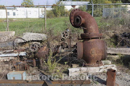 Photograph- A 12-inch throttle valve and a Schutte & Koerting emergency engine stop valve at the Youngstown Steel Heritage Museum; part of President Rick Rowlands' and other Youngstown Ste
