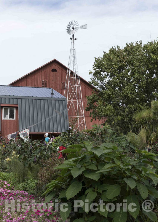 Photo- Garden and barn at Yoder's Amish Home, an Authentic Amish Farm That Began Accepting Visitors in 1983 Near Walnut Creek in Central Ohio, Along The Amish Country Byway 1