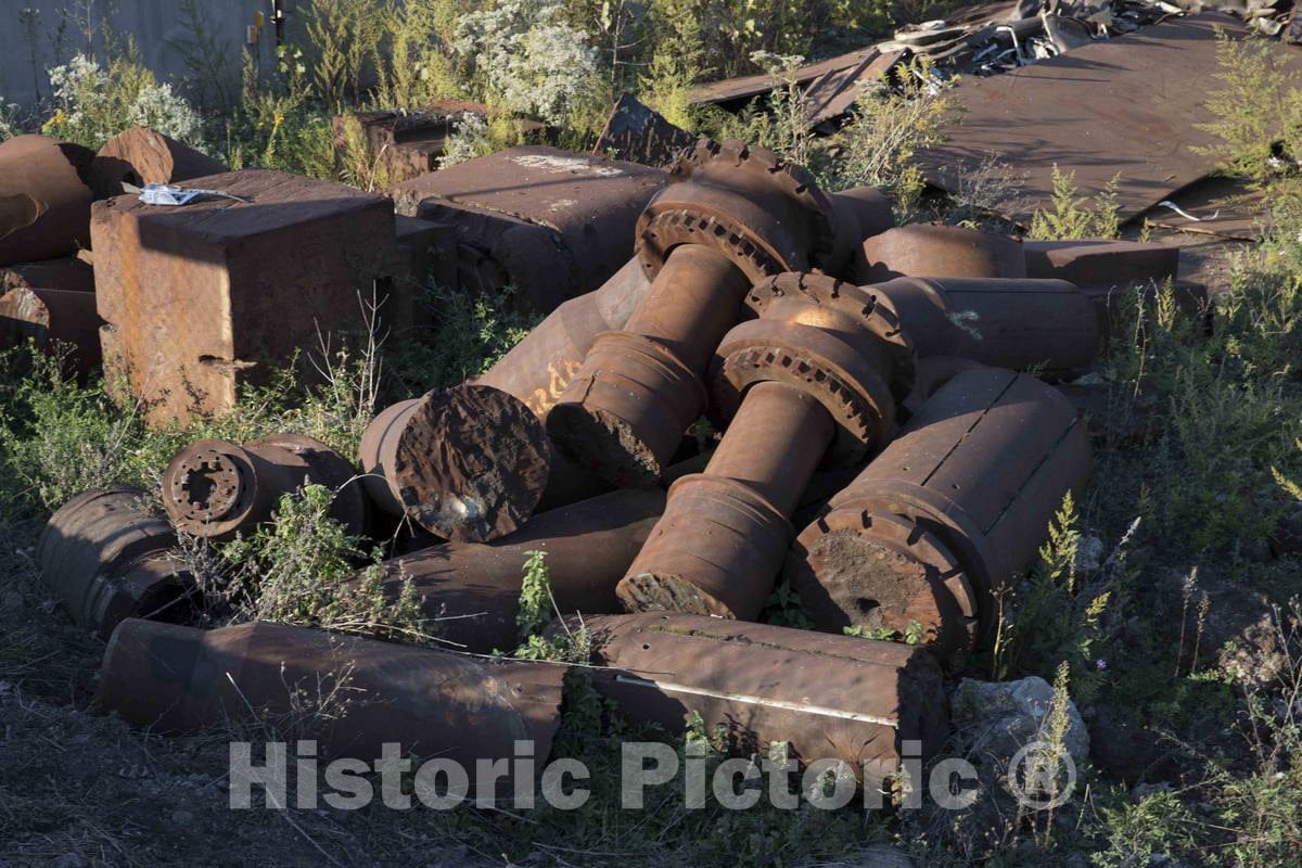 Photograph- Rusted steel-mill remnants in Mahoning County, Ohio, along a stretch of abandoned mills that once bustled with activity beside the Mahoning River between Youngstown and Struthers