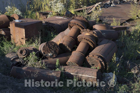 Photograph- Rusted steel-mill remnants in Mahoning County, Ohio, along a stretch of abandoned mills that once bustled with activity beside the Mahoning River between Youngstown and Struthers