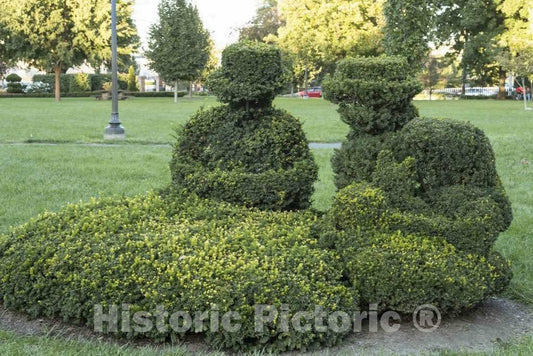 Photograph - This and Other Clipped Shrub Figures in The Topiary Garden in Downtown Columbus, Ohio, at The Old Deaf School Park, were Created to Represent Those in a Classic Painting 1