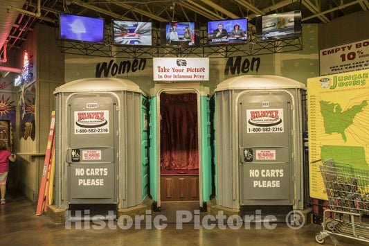 Photograph- Model (not functioning) Porta Potties, or movable toilets, designate the entrance to the real restrooms at Jungle Jim's International Market in the Cincinnati suburb of Fairfield