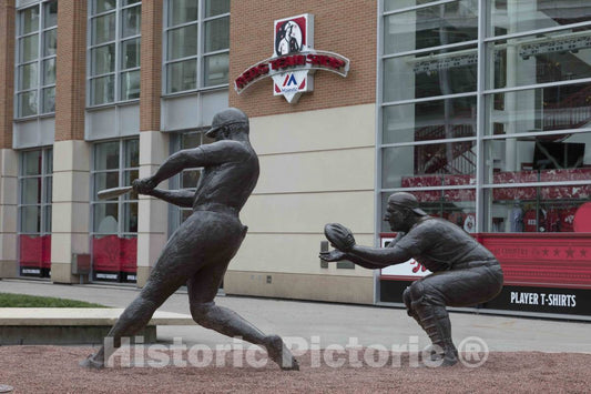 Photograph - Several statues by sculptor Tom Tsuchiya outside the Great American Ballpark, home of the Cincinnati Reds' baseball team, salute the team's legendary players, including, here 1