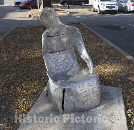 Photo - Sculpture that can double as a chair outside Findlay Market, a public market in the now-gentrified (in 2016) Over-the-Rhine neighborhood of Cincinnati, Ohio