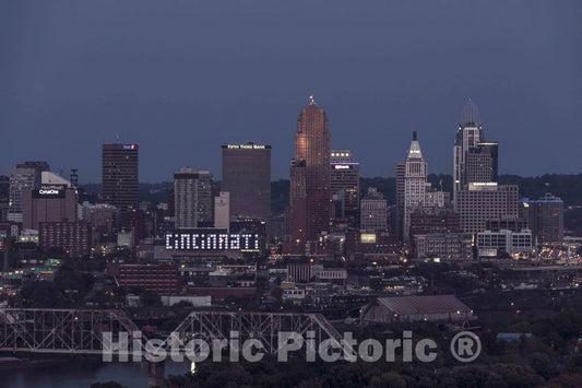 Photo - Dusk View of The Cincinnati, Ohio, Skyline, Including a Look at The Giant, Illuminated Cincinnati Sign on The city's Convention Center, Duke Energy Center