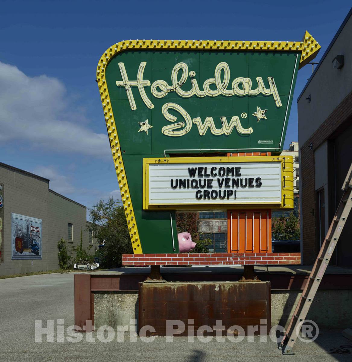 Photo - A Rescued Holiday Inn Hotel Sign Awaiting Rehabilitation Outside The American Sign Museum in The Industrial Camp Washington Neighborhood of Cincinnati, Ohio