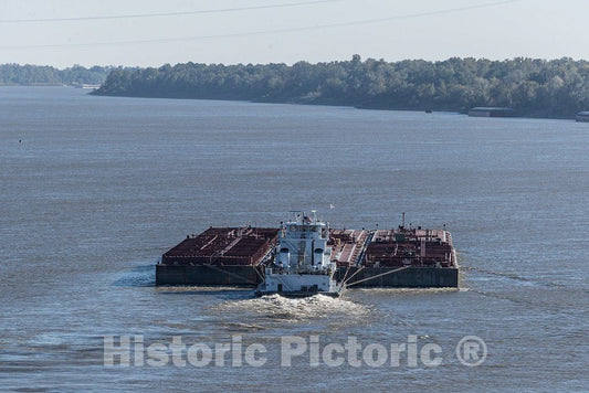 Photo - A tugboat pushes a wide barge upstream on the Mississippi River in the waters between Tunica County, Mississippi, and Phillips County, Arkansas- Fine Art Photo Reporduction