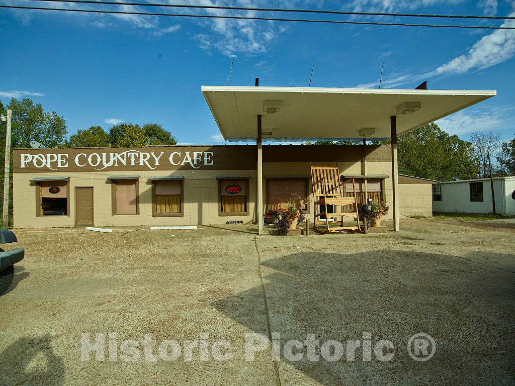 Photo - You Have Your Pick of Chairs, Including a gargantuan one Out Front, at The Pope Country Cafe in Sardis, Mississippi- Fine Art Photo Reporduction