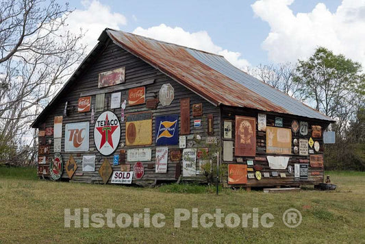 Photo- Barn in Sumter County, Georgia, festooned with The owner's Collection of Old Signs 1 Fine Art Photo Reproduction