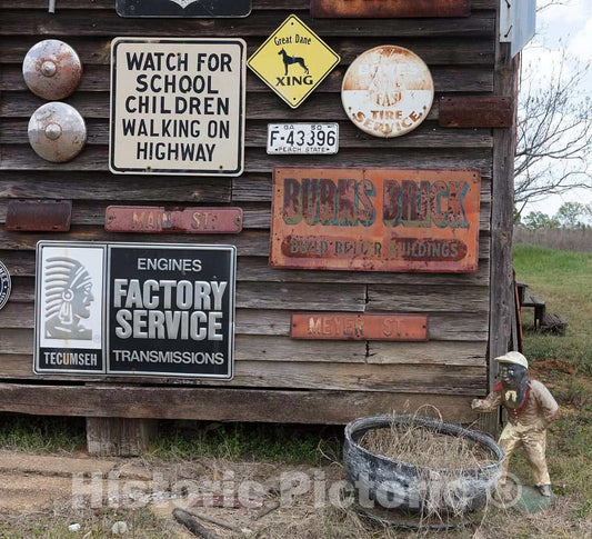 Photo- Portion of a barn in Sumter County, Georgia, festooned with The owner's Collection of Old Signs 1 Fine Art Photo Reproduction