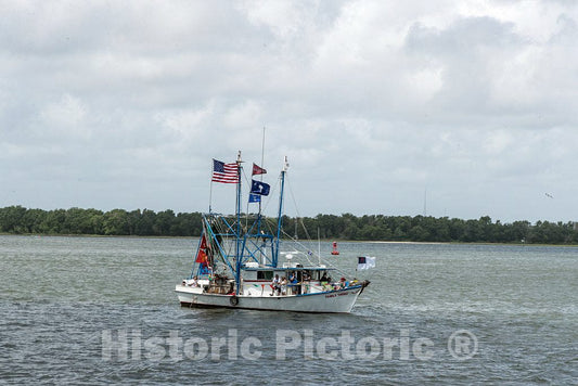 Photo- A Shrimp Boat Loaded with More Than Crustaceans and Crew, Passes by at The Annual Blessing of The Fleet of Shrimp Boats in The Atlantic Coast City of Mount Pleasant 1