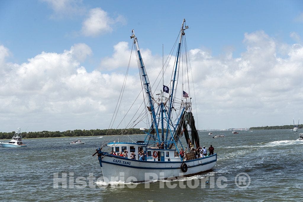 Photo - The Shrimp Boat Capt. Tang, Loaded with More Than Crustaceans and Crew, Passes by at The Annual Blessing of The Fleet of Shrimp Boats- Fine Art Photo Reporduction