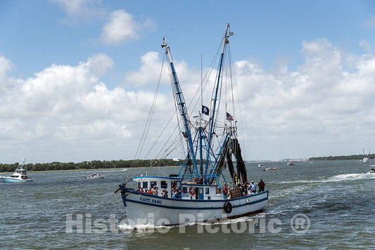 Photo - The Shrimp Boat Capt. Tang, Loaded with More Than Crustaceans and Crew, Passes by at The Annual Blessing of The Fleet of Shrimp Boats- Fine Art Photo Reporduction