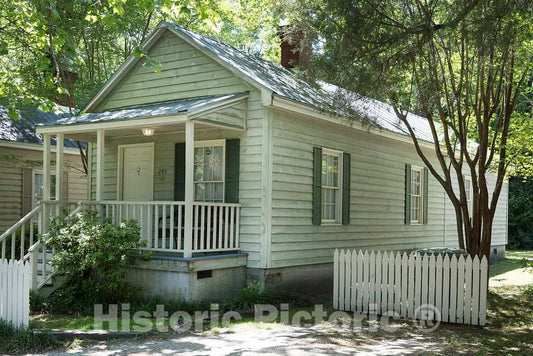 Photograph- A"shotgun house," once a worker's abode in Aiken, South Carolina during the period when the wealthy of the Carolina coast summered there to escape the coastal heat and humidity