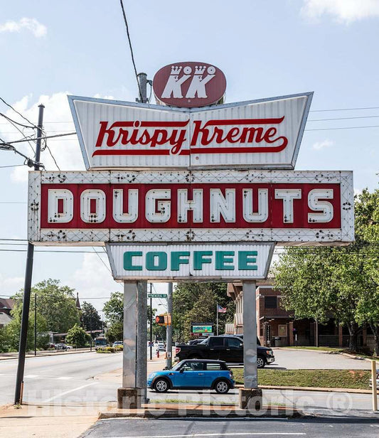 Photo- Enormous Sign for a Donut Shop in Spartanburg, South Carolina, a City in The Foothills of The Blue Ridge Mountains roughly Midway Between Atlanta, Georgia, and Charlotte