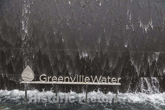 Photo- A cascade down the side of the Peace Center, an entertainment and cultural venue in downtown Greenville, South Carolina. Greenville Water is the local water utility company