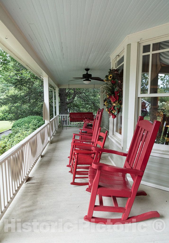 Photo- The Namesake Rocking Chairs on The Long Porch at The Red Rocker Inn, a Restored 1896 Victorian Home and inn is Now a Bed-and-Breakfast inn, in Black Mountain, North Carolina