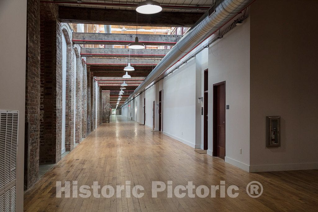 Photo- Corridor inside one of the old Cone Mills's White Oak plant established in 1891 as a factory making flannel goods, and purchased by the Cone Brothers in 1905 in Greensboro
