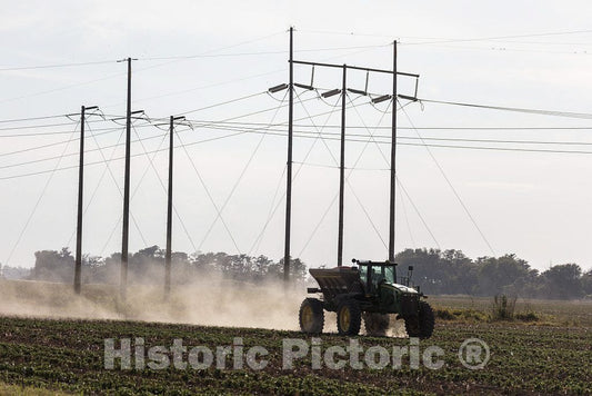 Photo - A Farm Vehicle Kicks up dust in a Field Near Tunica, Mississippi- Fine Art Photo Reporduction