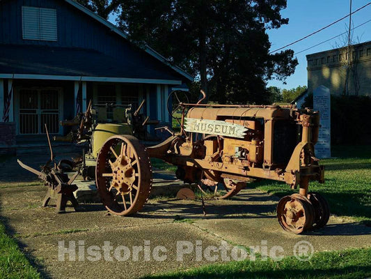 Photo - An old tractor stands outside the North Delta Museum in Friars Point, Mississippi, the hometown of country-music singing legend Conway Twitty- Fine Art Photo Reporduction