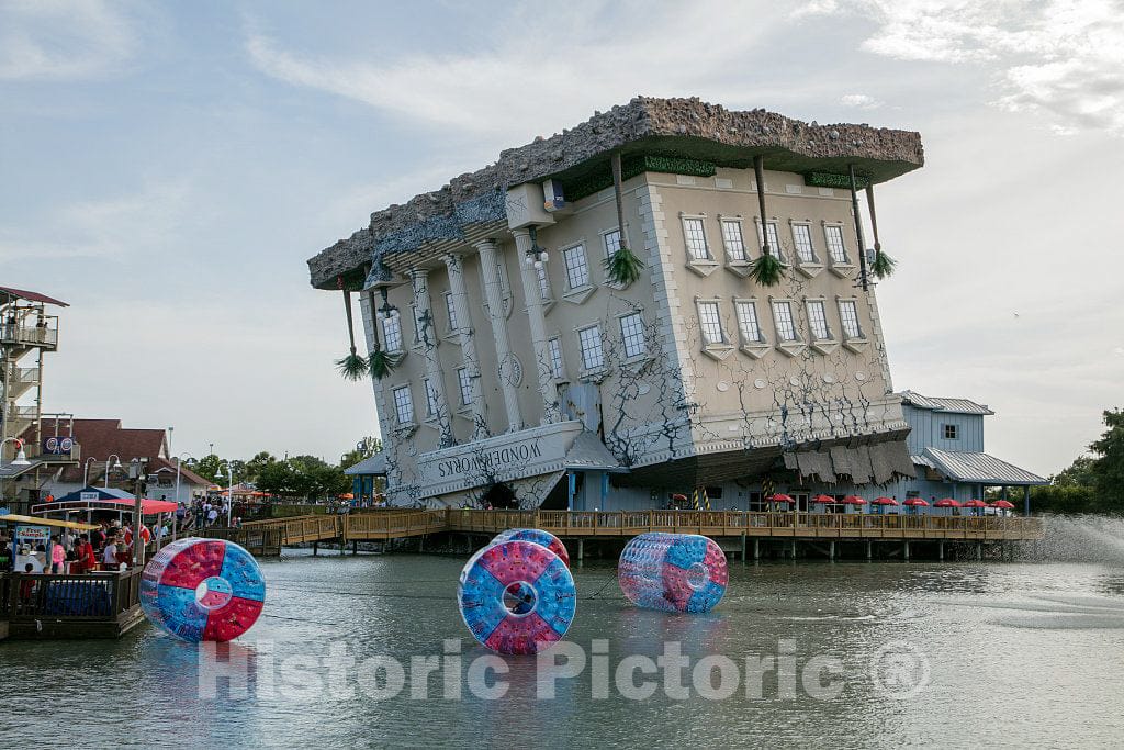 Photograph- If you want to get attention for your Broadway at the Beach amusement area in Myrtle Beach, South Carolina, simply turn a building upside down and cant it at a precarious angle
