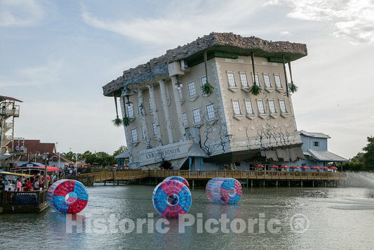 Photograph- If you want to get attention for your Broadway at the Beach amusement area in Myrtle Beach, South Carolina, simply turn a building upside down and cant it at a precarious angle